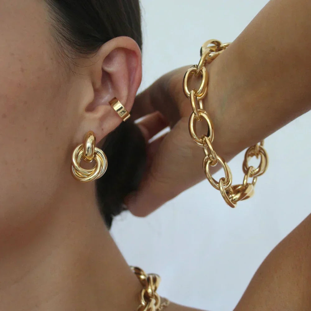 Udsagn Interlocking Øreringe | Guld